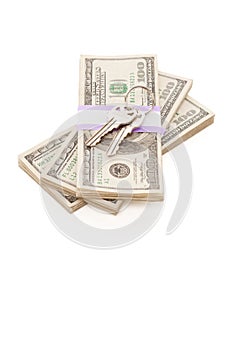 House Keys on Stack of Money Isolated
