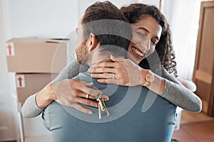 House keys, success or happy couple hug in real estate, property investment or buying apartment. New home goal