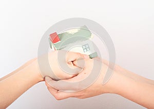 House in kids hands