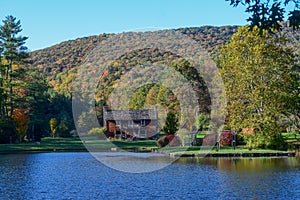 House by the lake at Glen Alton Recreation Area in autumn,