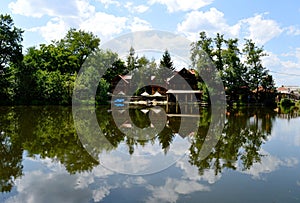house by the lake and reflection in the lake water
