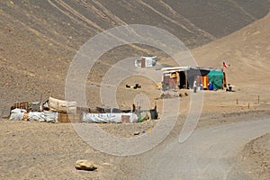 House and landscape of the route 6000, Atacama Desert, Chile