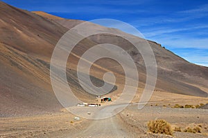 House and landscape of the route 6000, Atacama Desert, Chile