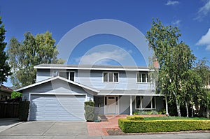 House with landscaping and shrubs