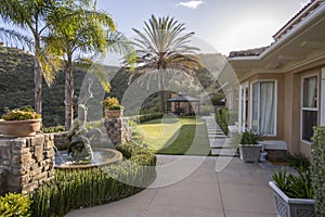 House, lawn and water features in San Diego home