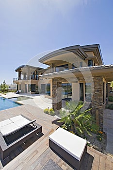 House And Lounge Chairs By Poolside