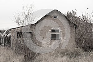 House made of clay in a village old dilapidated in Ukraine in the fall in the city of Dnipro