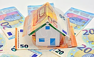 House made with 50 and 20 euro bills photo