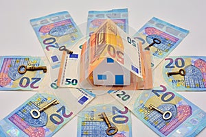 House made with 50 and 20 euro bills photo