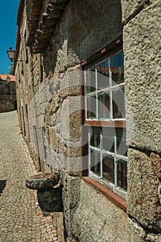 House made of stone and glazed window