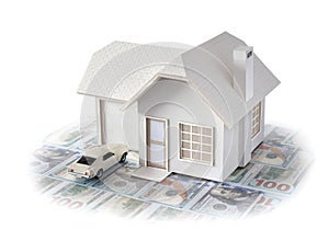 House miniature with car isolated in white background for real estate and construction concepts. House miniature designed and crea