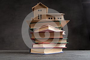 House model, gavel and books on the desk, Real property law concept, real estate auction