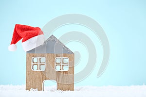 House model with red santa hat