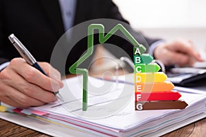 House Model Showing Energy Efficiency Rate