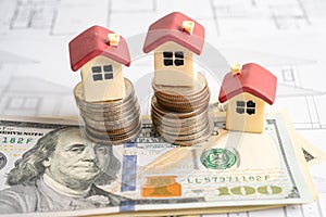 House model with stack of coin money, home loan, saving plan, installment payment finance and banking concept