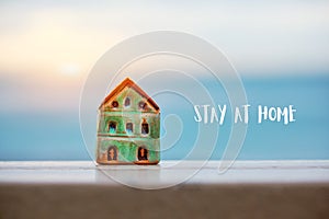 House model with Stay at home text