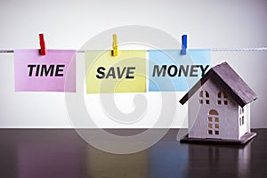 House model and text TIME SAVE MONEY