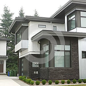House Modern Designer Exterior Home Brown Silver Siding