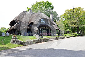 House with mushroom cap style roof in Charlevoix Michigan