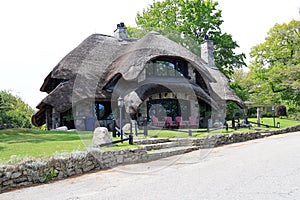 House with mushroom cap style roof in Charlevoix Michigan