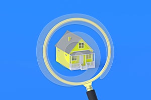 House near magnifier. Search for affordable housing
