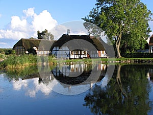 House near the pond in Danmark photo