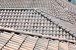 House with new roofs and tiles in the form of a tile. photo