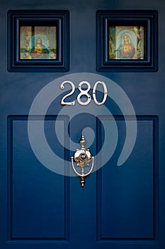 House number 280 with Jesus and Maria