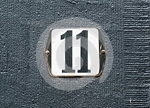 House Number 11 Black number on white plate
