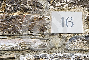 House number 16 sign photo