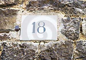 House number 18 sign. photo