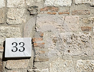 House number 33 sign photo