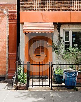 House with orange door in Greenpoint, Brooklyn, New York City