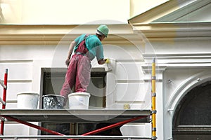 The house painter behind work.