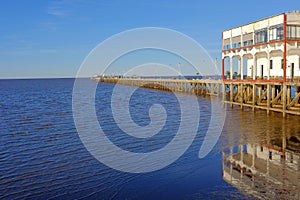 House and pier dock of the Club De Pescadores, Fisherman`s Club, Rio de la Plata, Buenos Aires, Argentina