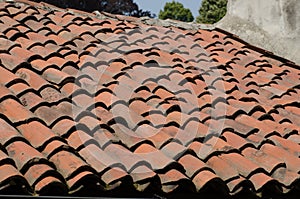 House with pitched roofs with brick tiles. photo