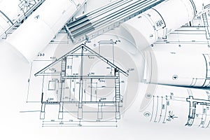 House plan blueprint and folding ruler on architects workplace