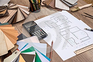 House plan with palette of colors and wooden sampler