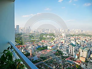 House plants at compact balcony garden of high-rise apartment aerial view dense of multistory residential home caged balcony, high