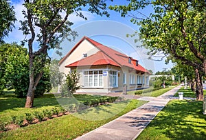 House with a red roof on the territory of VDNKh in Moscow