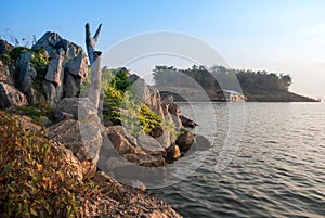 House reflected in scenic lake