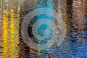 House reflections on river