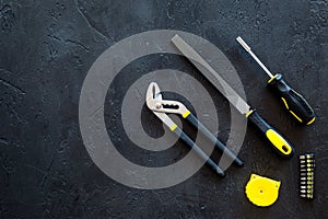 House renovation with implements set for building, painting and repair black table background top view mockup
