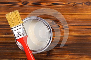 House renovation, paint can on the old wooden background with copy space - Image