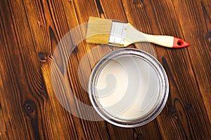 House renovation, paint can on the old wooden background with copy space - Image