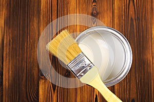 House renovation, paint can on the old wooden background with copy space - Image