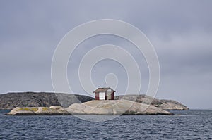 House on rock in archipelago photo