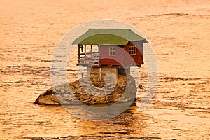 House on rock island in river Drina - Serbia