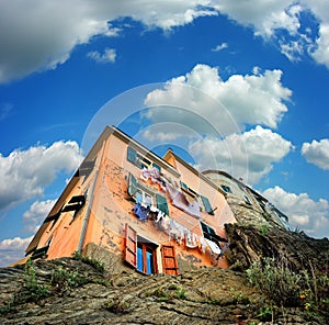 House on rocks in village Of Manarola