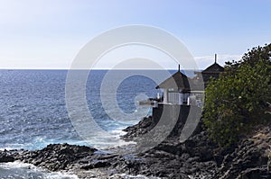 House on a rocky cliff of the sea